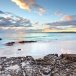 Dawn skies and ocean beach Jervis Bay NSW Australia