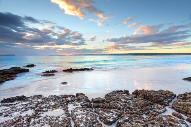 Dawn skies and ocean beach Jervis Bay NSW Australia