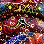 Colourful hand painted boomerang featuring a kangaroo at a market stall in Melbourne Australia